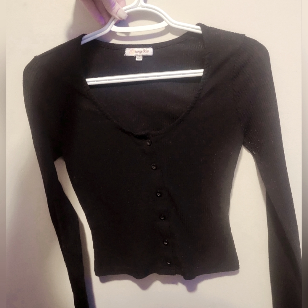 Womens long sleeve button up crop top.